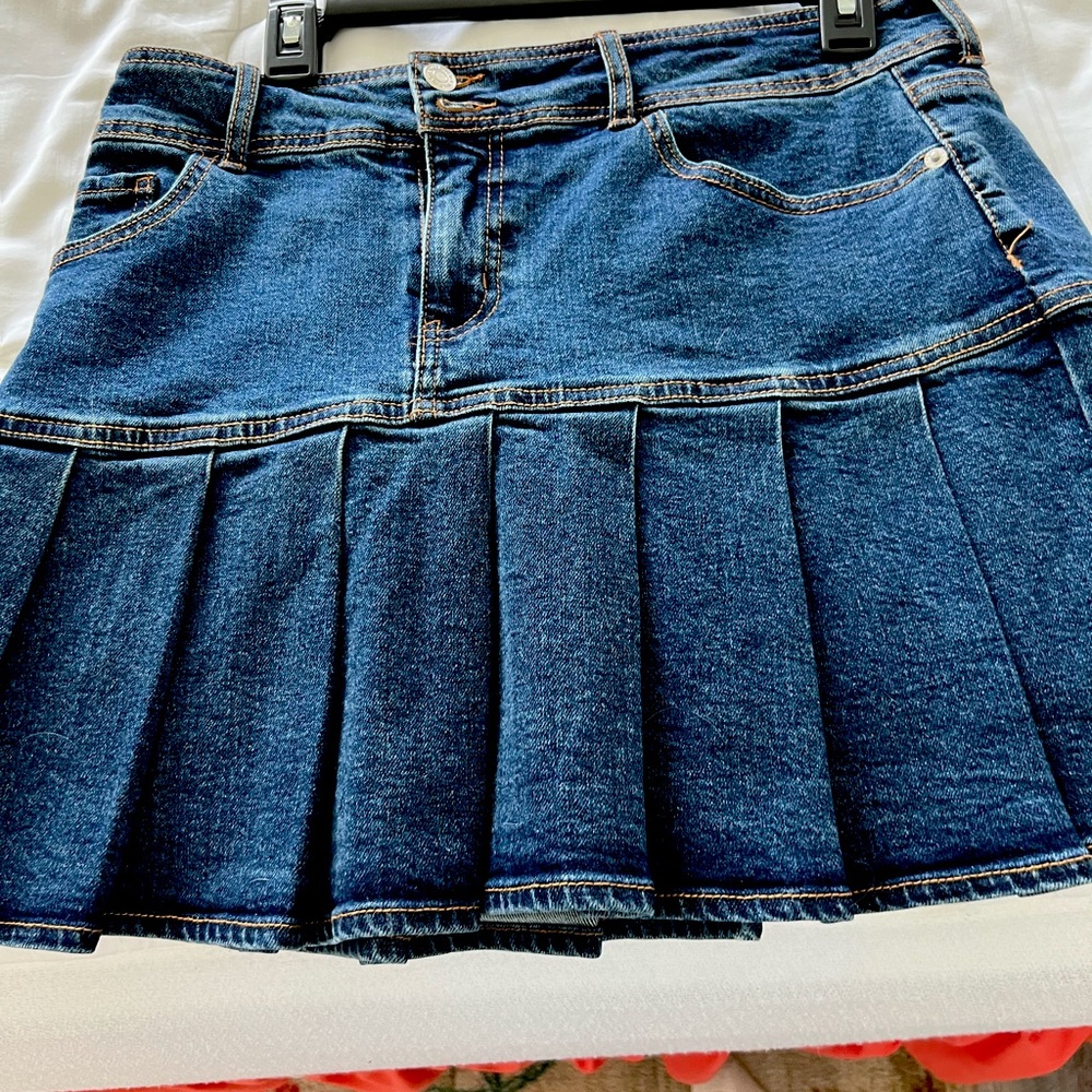 Cute, adorable pleated denim skirt. i’m 5’2 and it’s not too short.